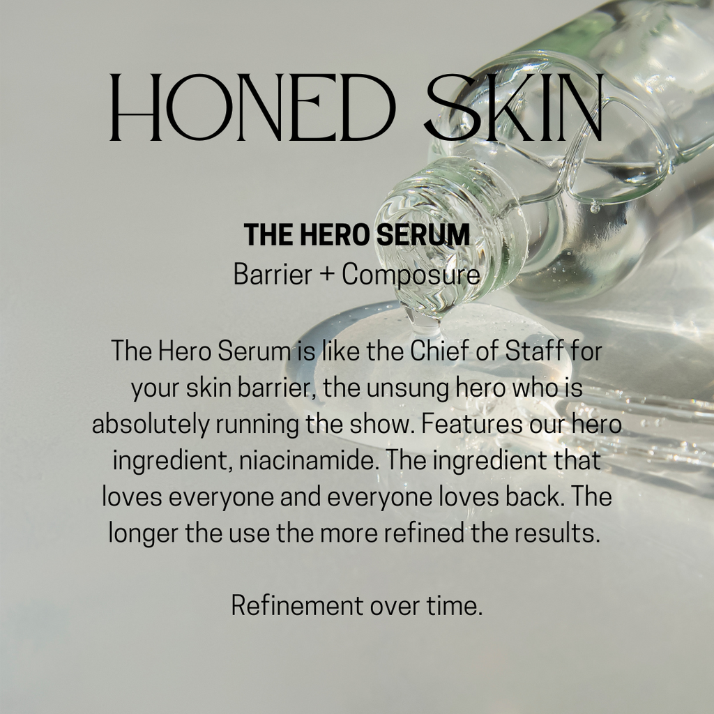 Glass bottle labeled 'The Hero Serum' with text about skin barrier and active ingredient niacinamide on a light gray background.
