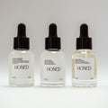 Peptide, niacinamide and Bakuchiol 'Honed' skincare serums on a white background